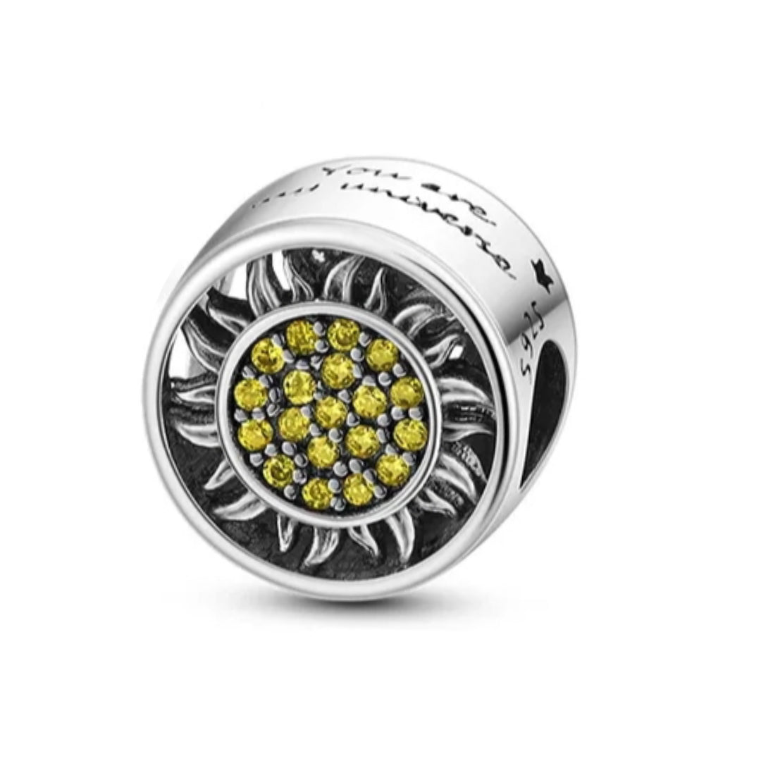 Charm sol amarillo de plata s925